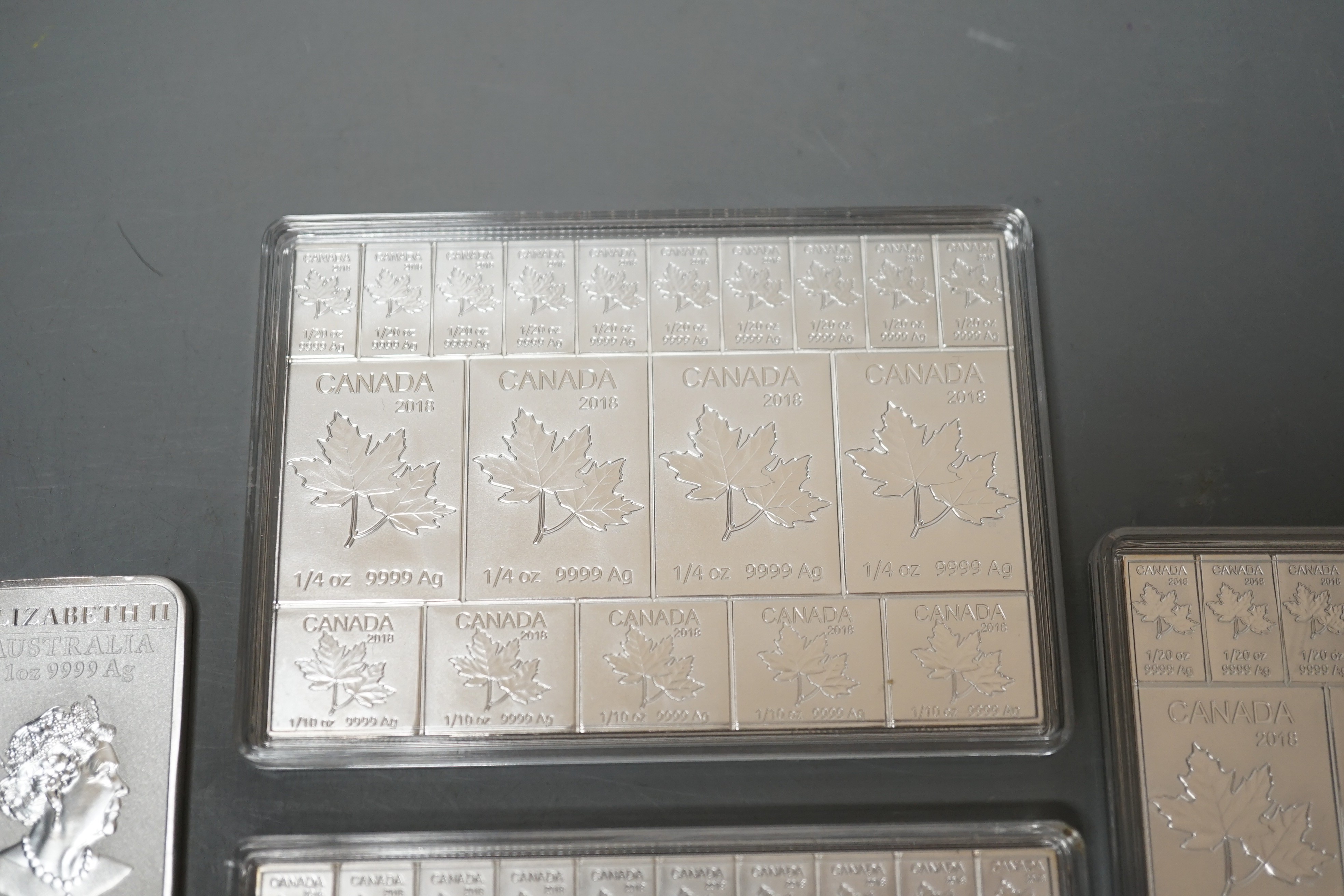 Three Canada 2018 2oz silver bullion ingots and an Australian 1oz. one dollar ingot